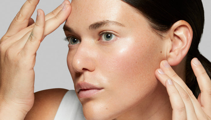 girl applying toner