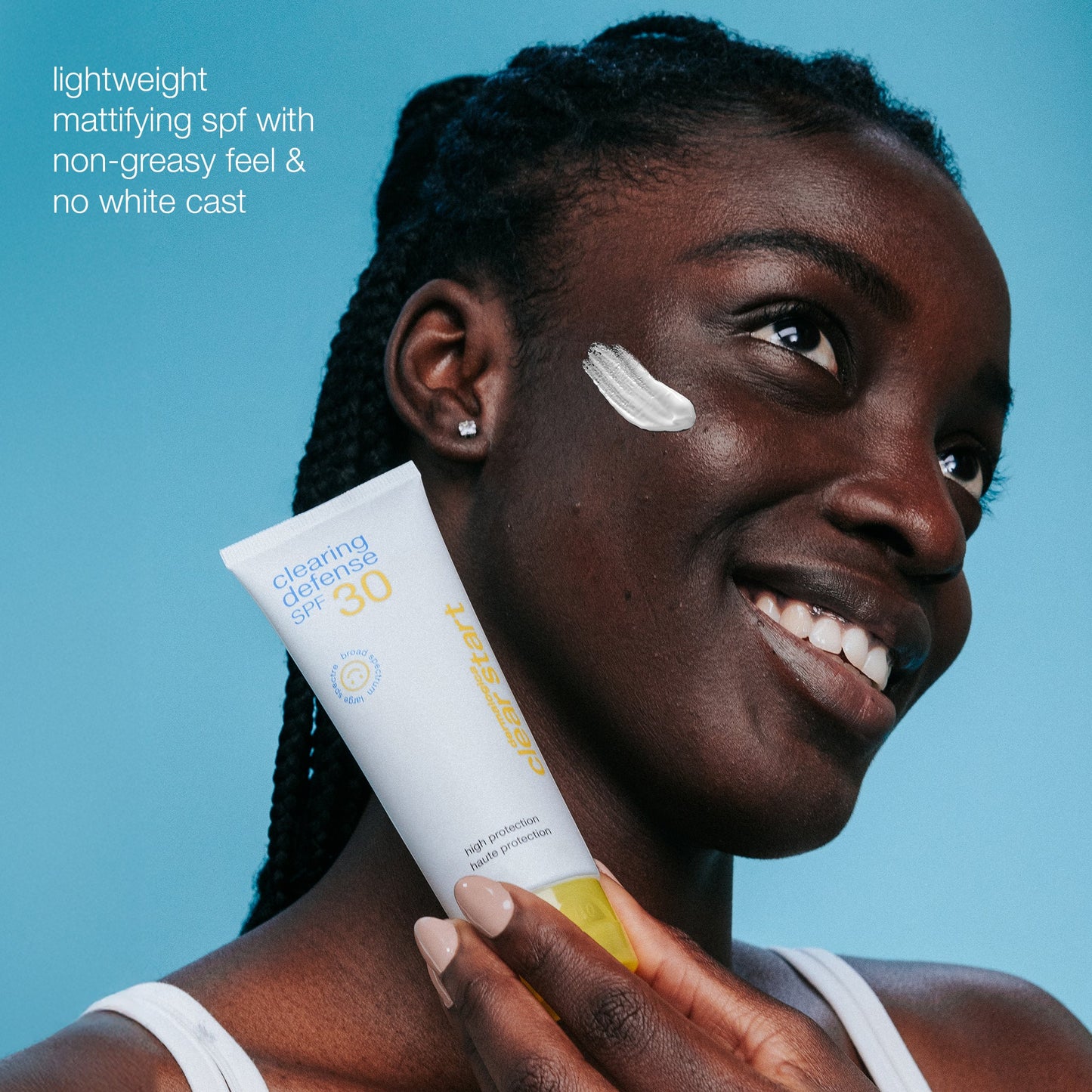 model holding clearing defense spf30