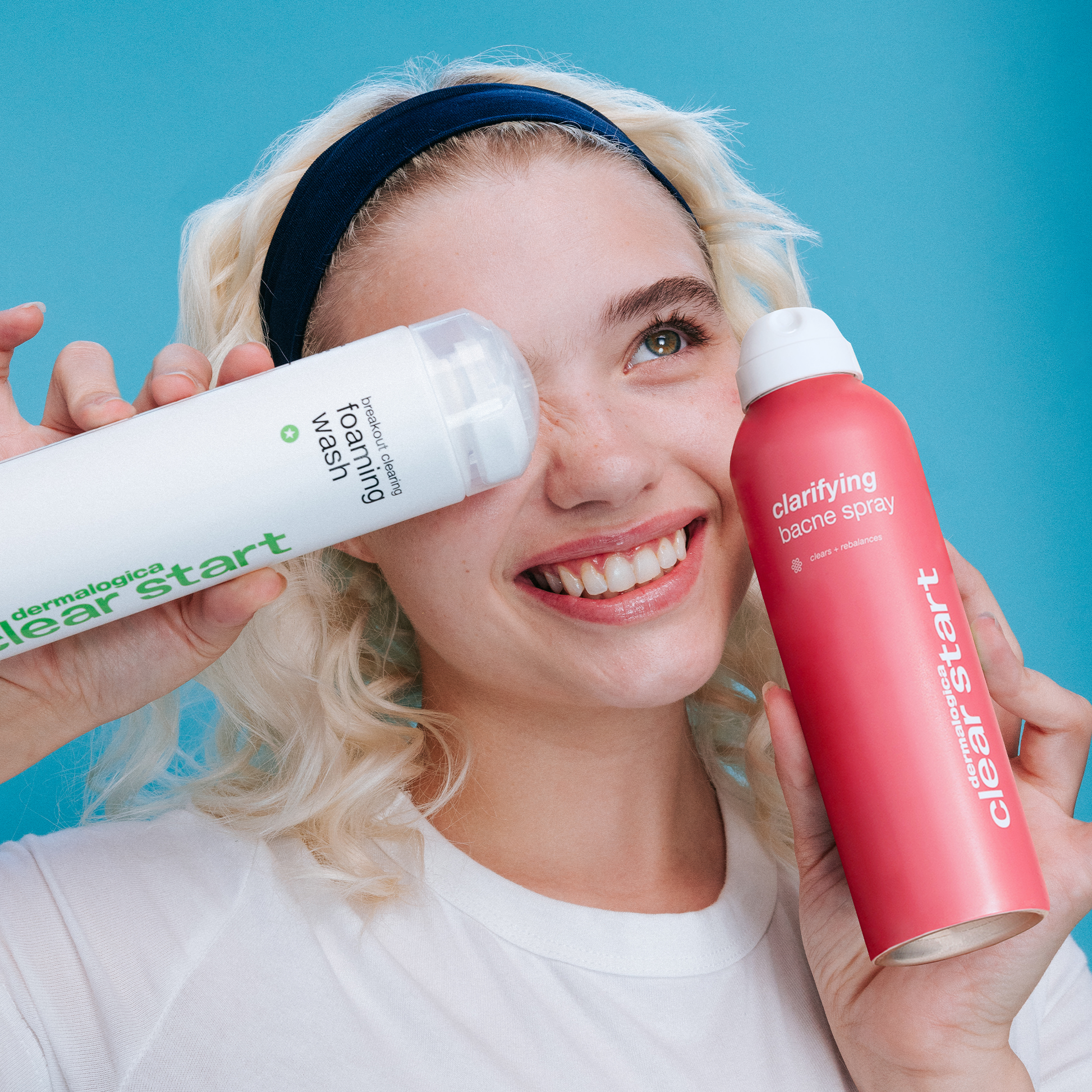 Model holding the Body Acne Duo