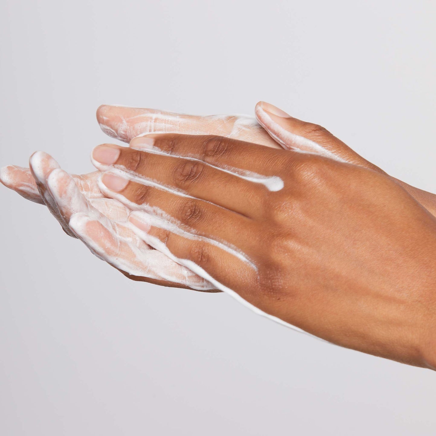 daily microfoliant being lathered into hands