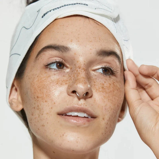woman wearing dermalogica headband