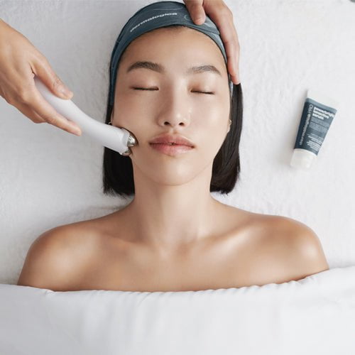 woman receiving facial treatment