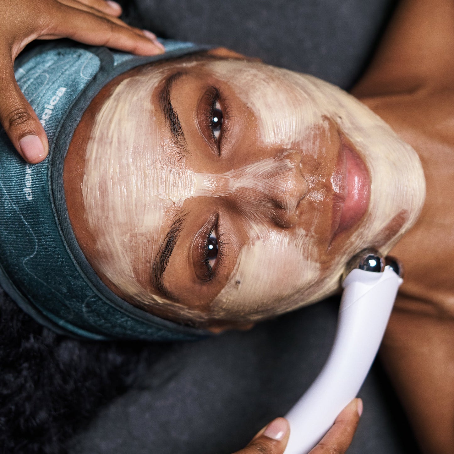 model receiving skin treatment