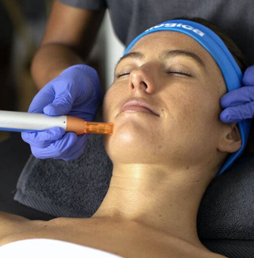 woman receiving facial treatment