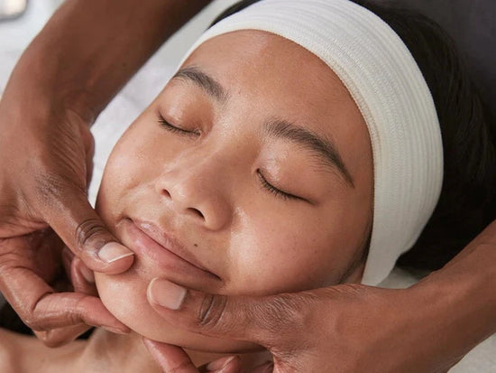 woman smiling receiving treatment
