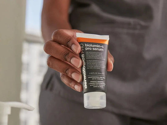 hand holding biolumin-c serum
