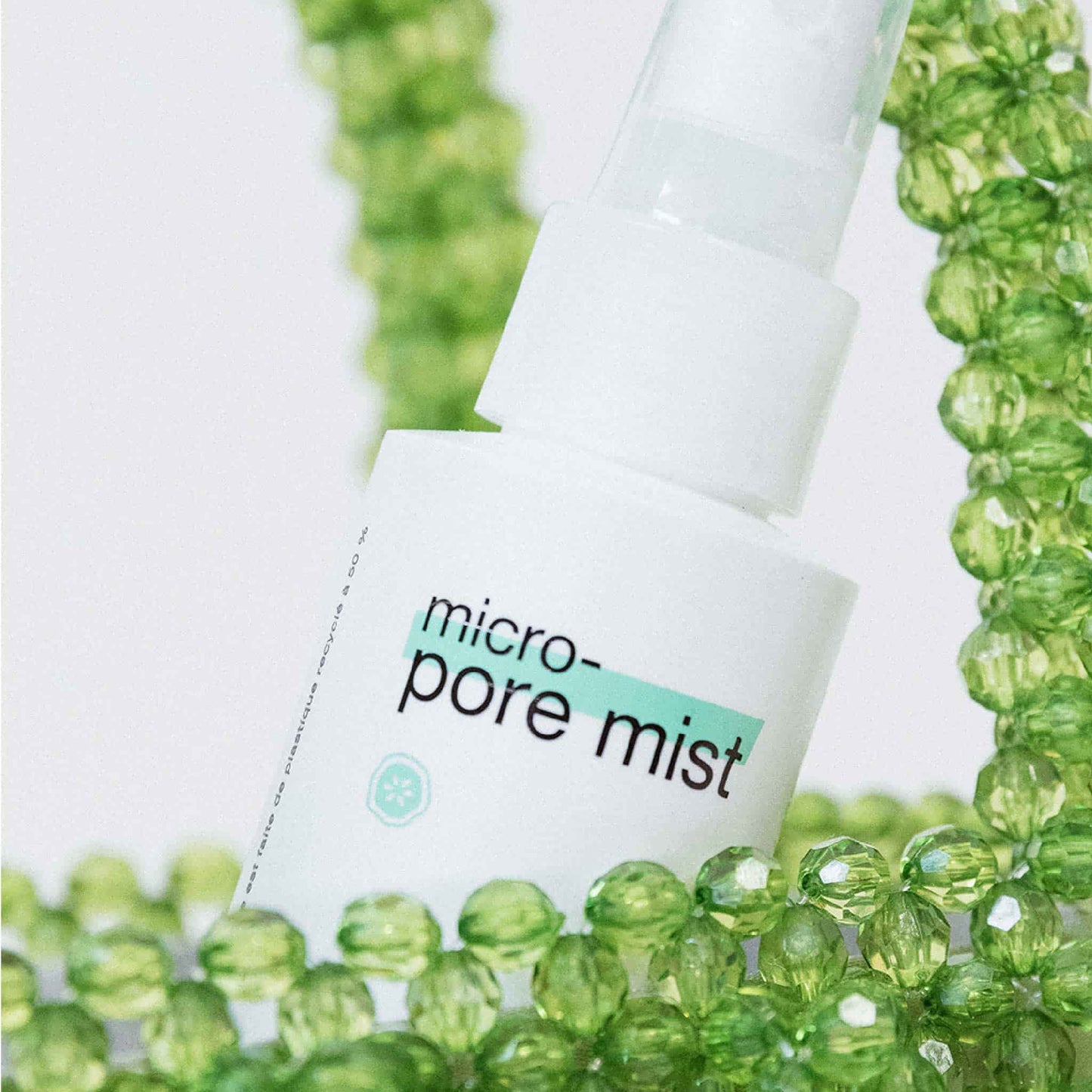 Close-up of Micro-Pore Mist with green beads 