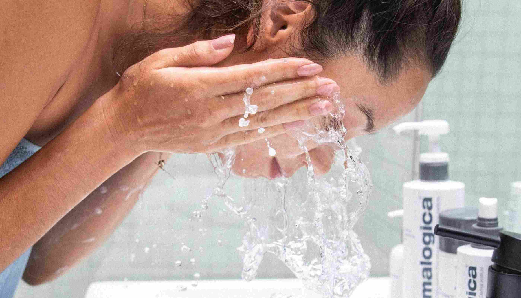 woman washing face