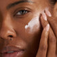 get + keep your glow model with product on face