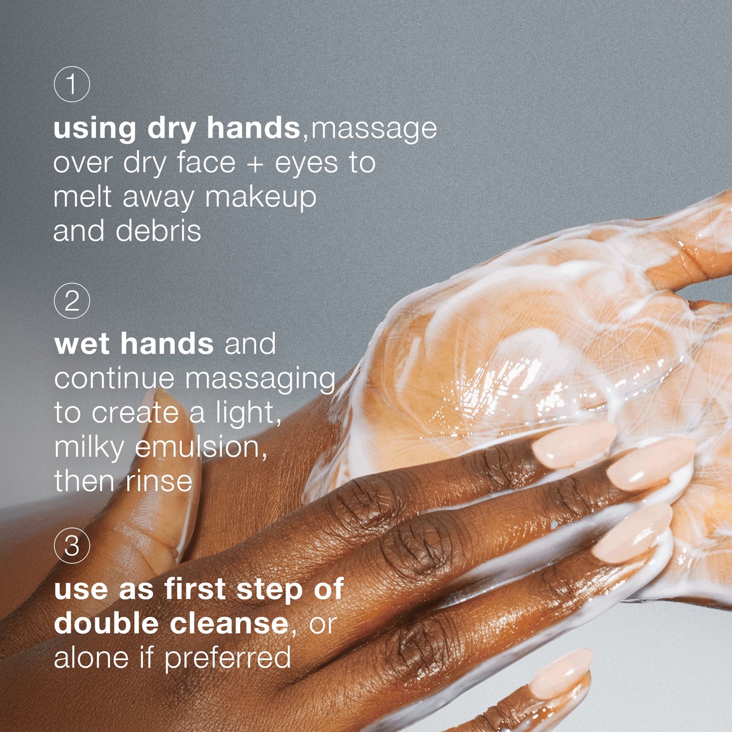 Hands applying a foamy skincare product with text instructions on a gray background 