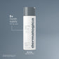 Dermalogica oil to foam cleanser bottle with text on a gray background. 5+ month supply and estimated 167 uses.