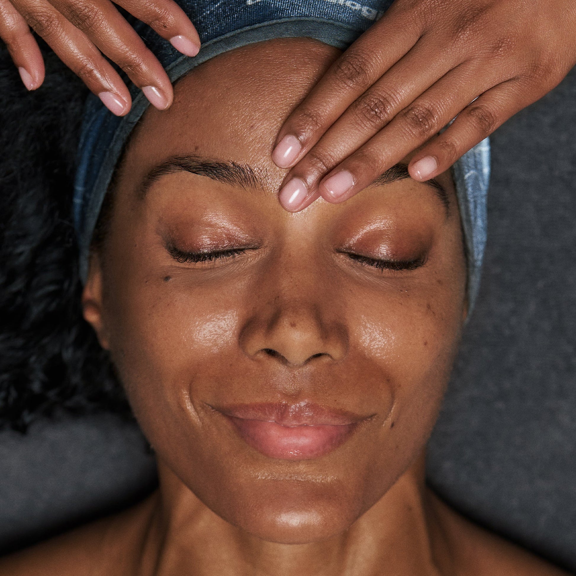 model receiving skin treatment