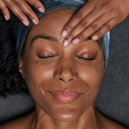 model receiving skin treatment