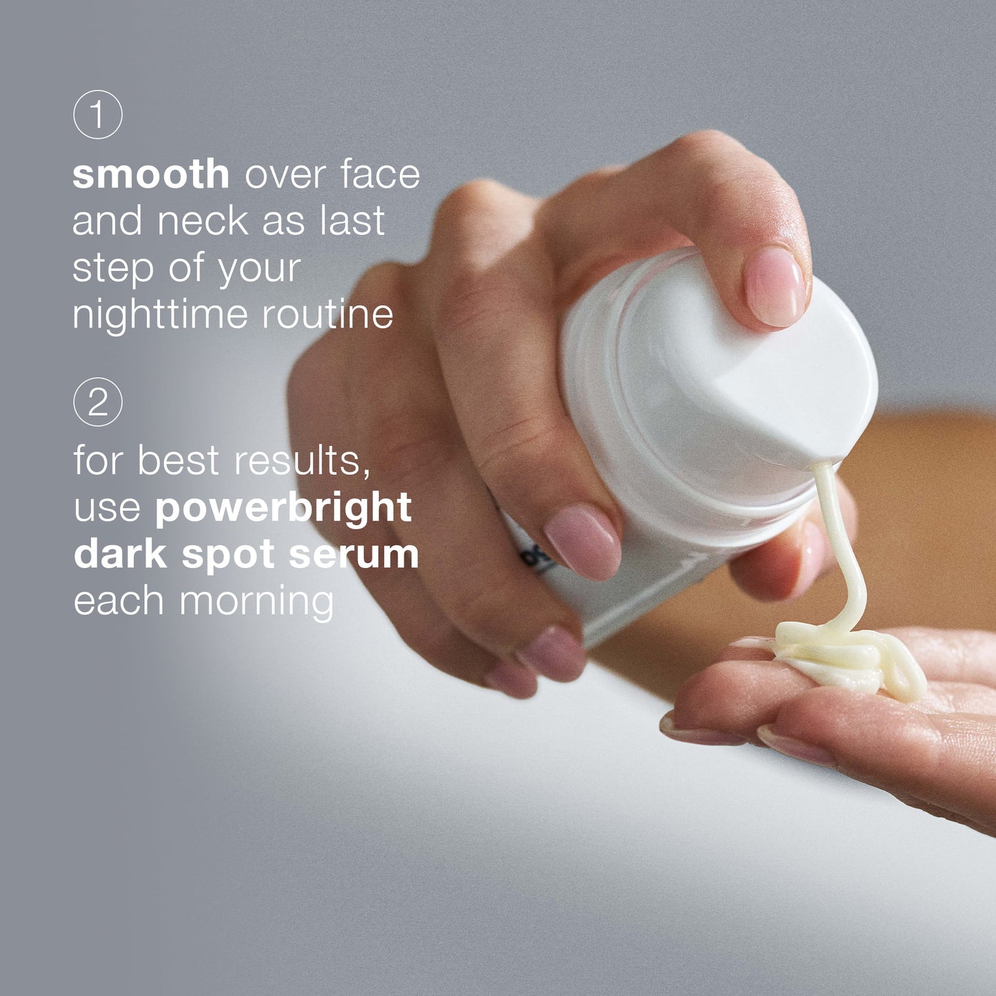 Hand holding a bottle of skincare serum with text on a gray background 