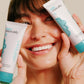 Model holding Cooling Aqua Jelly bottles to face