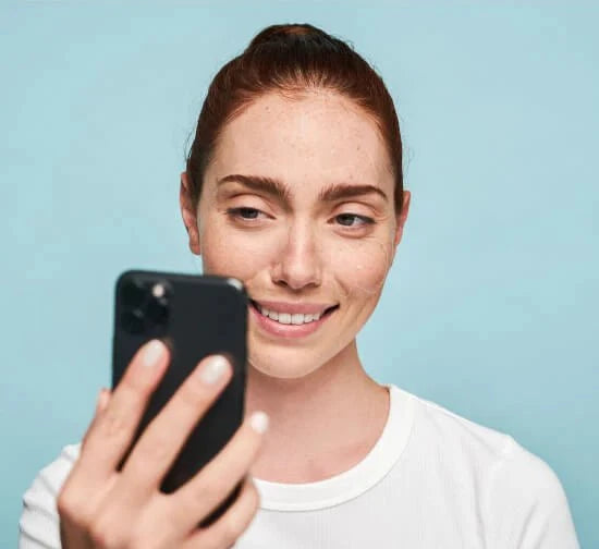 woman face mapping on phone