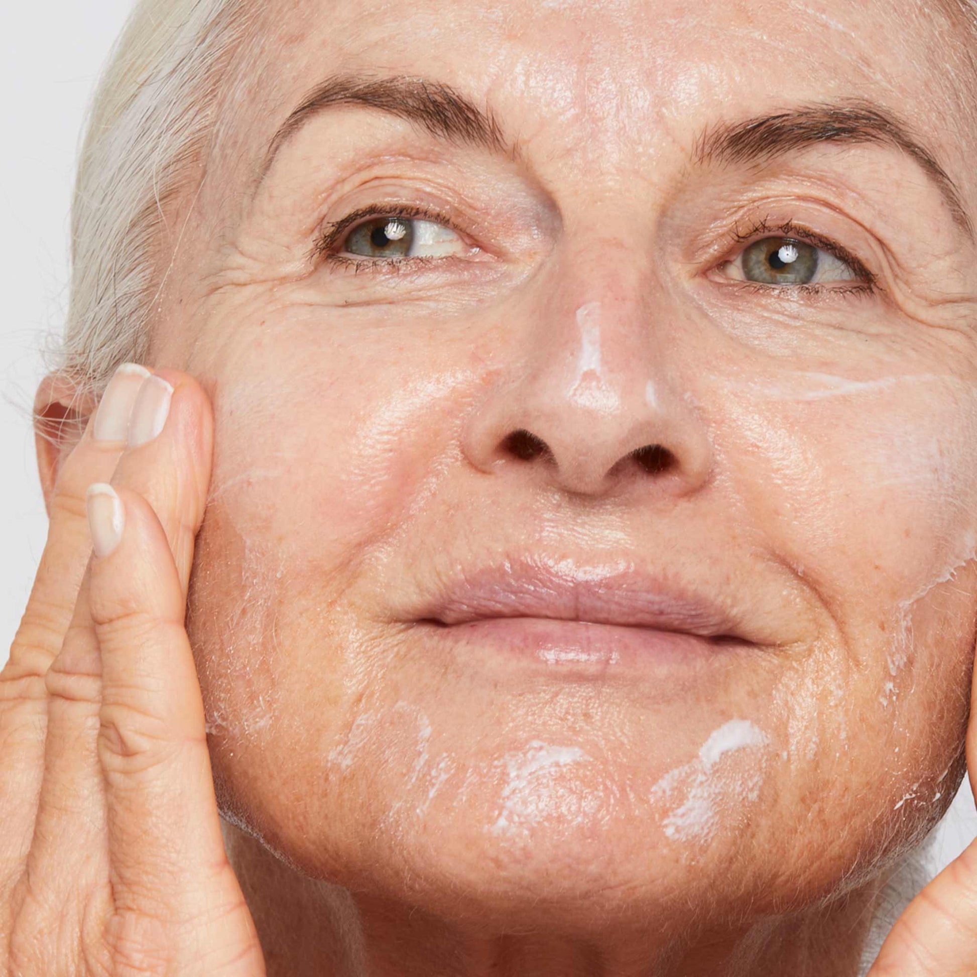 woman applying super rich repair