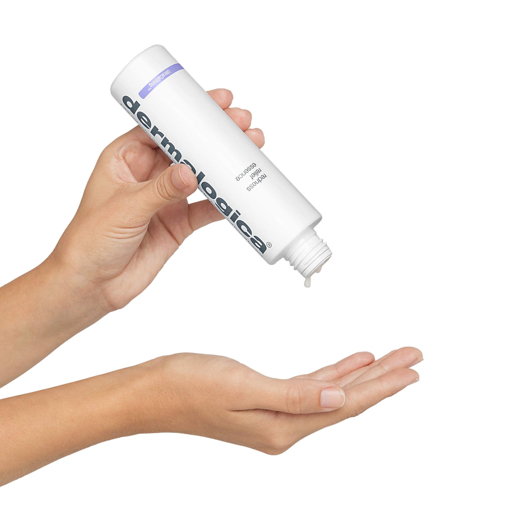 redness relief essence being dispensed into hands