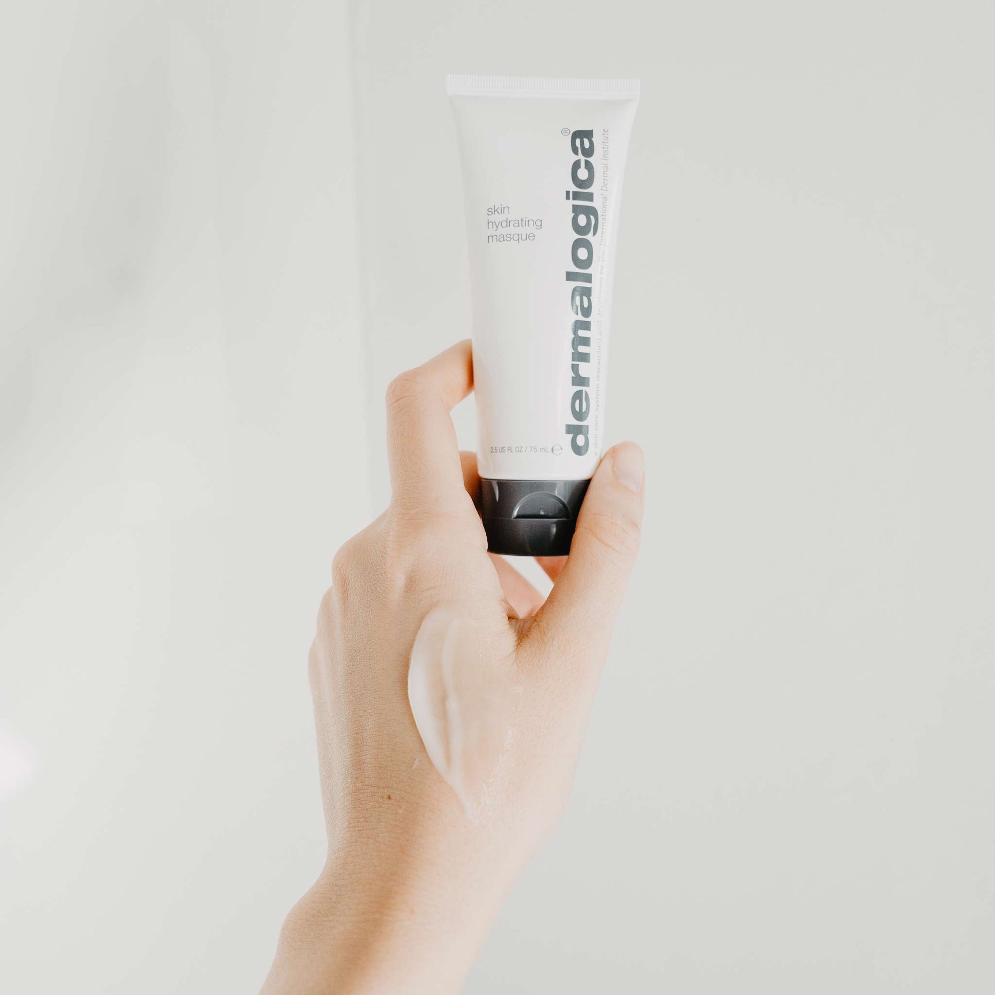hand holding skin hydrating masque